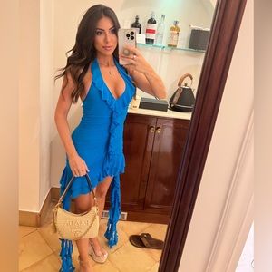 Blue Ruffle Trim Asymmetrical Hem Backless Halter
Neck Dress